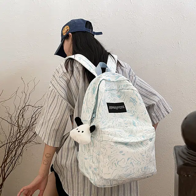草丛喵喵喵 大容量 简约潮 街头时尚学院风学生书包旅游休闲运动健身 尼龙 双肩包 常规 男女同款情侣款 白色/黑色/红色/浅蓝色