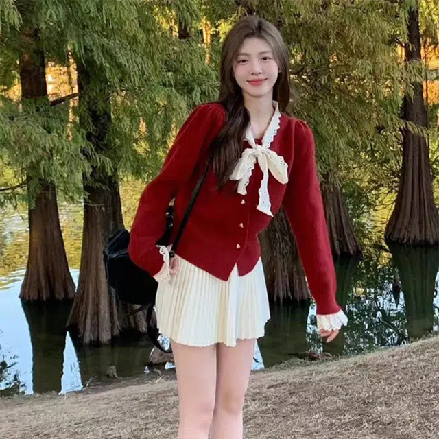 玉儿恋 韩版蕾丝蝴蝶结设计感收腰短款长袖针织衫 女款
