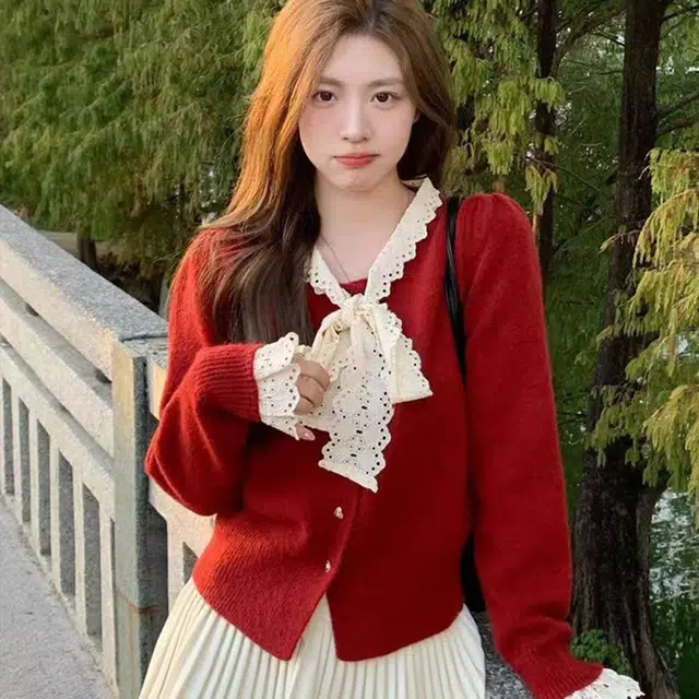玉儿恋 韩版蕾丝蝴蝶结设计感收腰短款长袖针织衫 女款