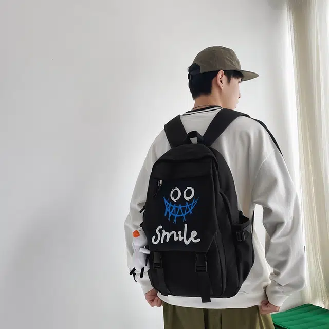 雅鹿 搞怪涂鸦书包小众设计感简约日系高中生大学生 尼龙布 背包双肩包 常规 男女同款情侣款 黑色/白色