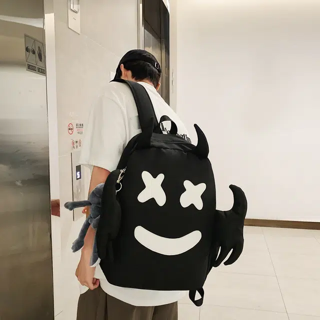 雅鹿 幽灵大容量嘻哈街头校园风丑萌搞怪 尼龙布 背包双肩包 男女同款情侣款 白色/黑色