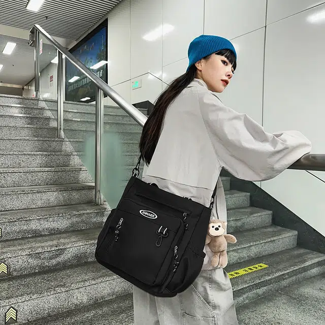 雅鹿 帆布包大容量男初中生装书包手提袋女通勤休闲拎书袋 尼龙 单肩包斜挎包 男女同款情侣款 黑色/红色/白色/蓝色