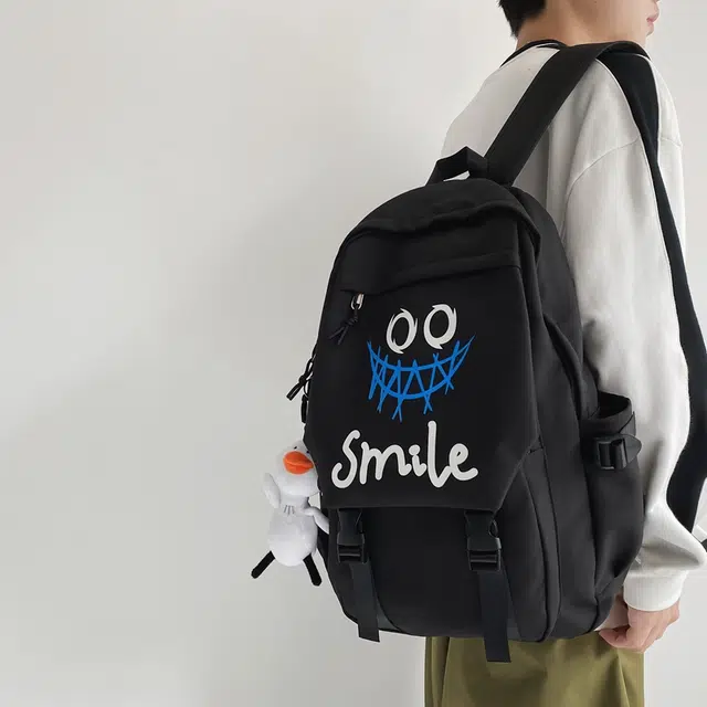 雅鹿 搞怪涂鸦书包小众设计感简约日系高中生大学生 尼龙布 背包双肩包 常规 男女同款情侣款 黑色/白色