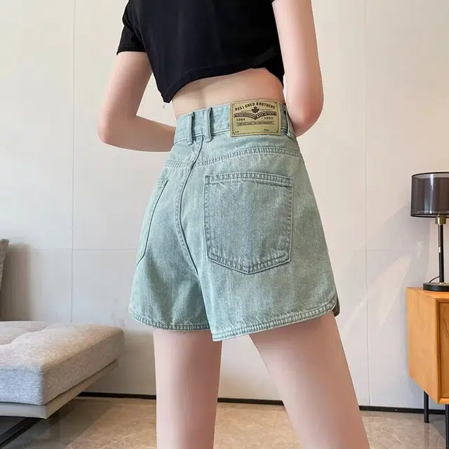 欧迪芬 时尚百搭显瘦显高阔腿简约舒适高腰牛仔短裤 女款 浅蓝