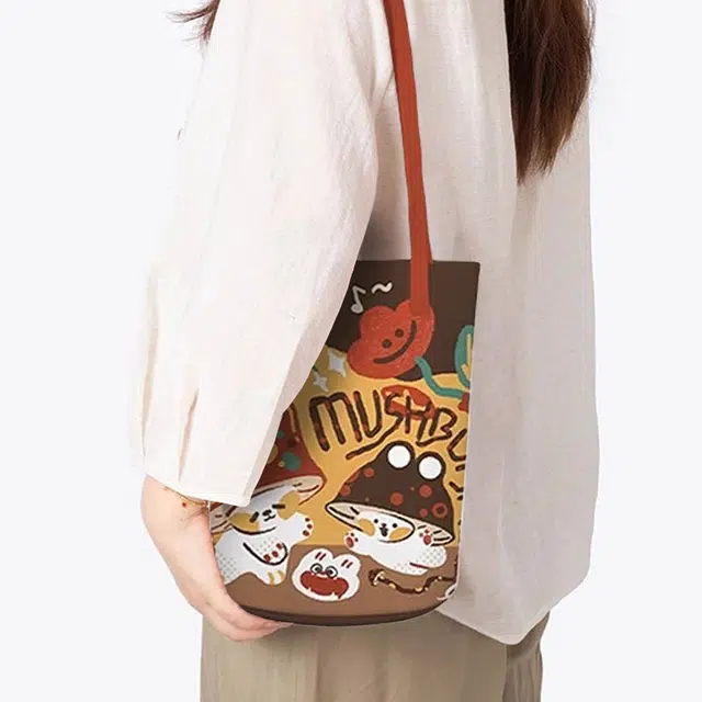 奥松 上班通勤慵懒设计感小众休闲 绒面科技布 水桶包单肩包 女款 黄色