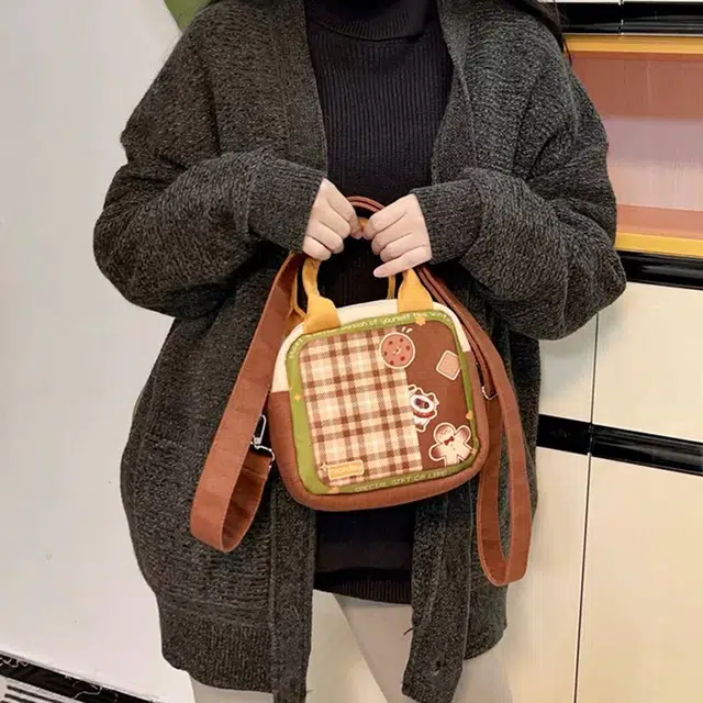 奥松 休闲百搭 绒面科技布 斜挎包 男女同款情侣款 棕色