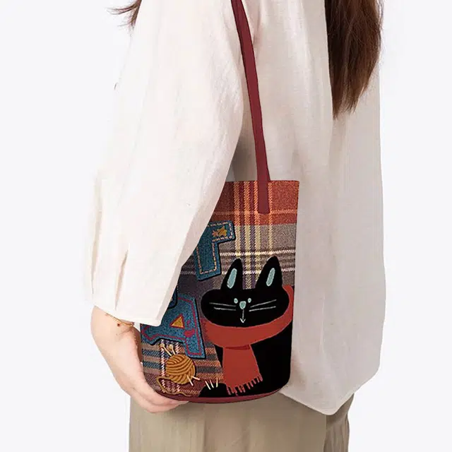 奥松 时尚百搭休闲磁扣开合 绒面科技布 水桶包单肩包 女款 牛仔酷猫
