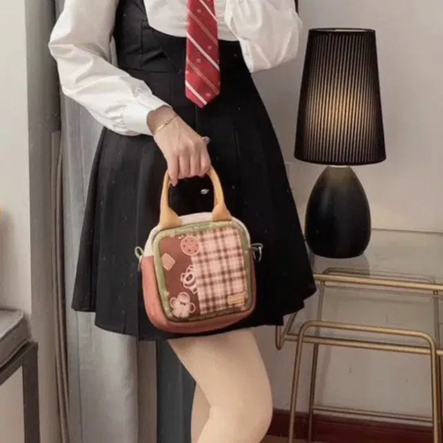 奥松 休闲百搭 绒面科技布 斜挎包 男女同款情侣款 棕色