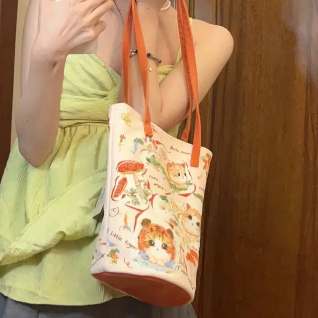 奥松 简约上班文艺百搭可爱 绒面科技布 水桶包单肩包 女款 橘猫