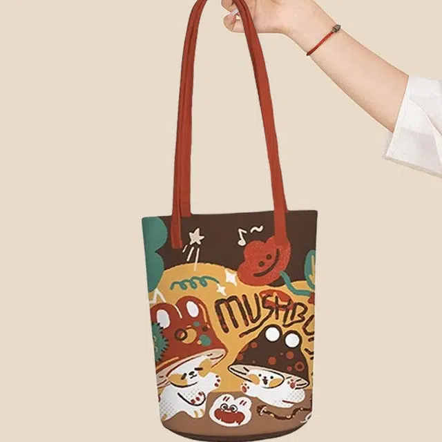 奥松 上班通勤慵懒设计感小众休闲 绒面科技布 水桶包单肩包 女款 黄色