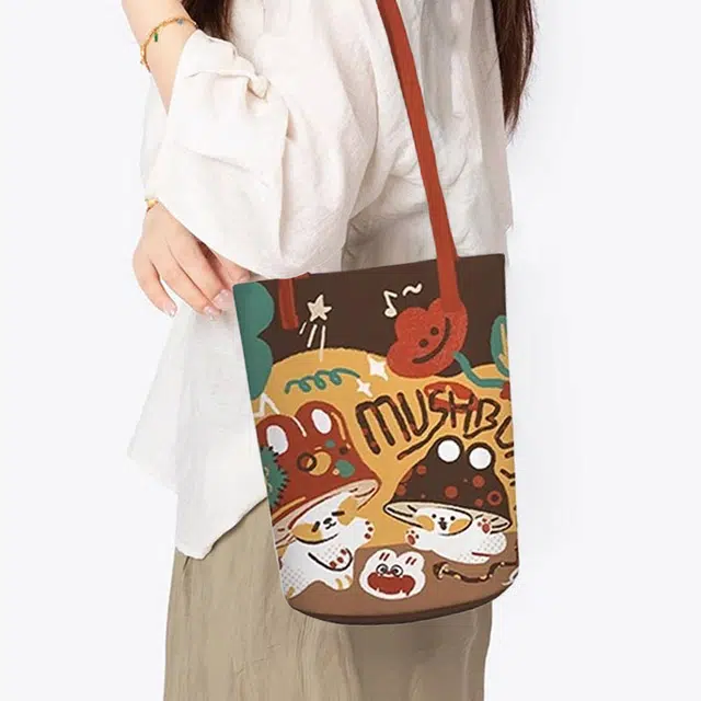 奥松 上班通勤慵懒设计感小众休闲 绒面科技布 水桶包单肩包 女款 黄色