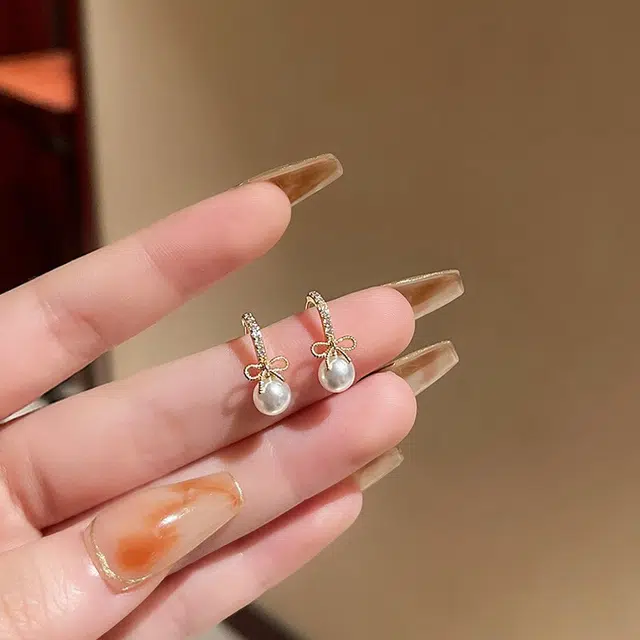 丹琴 爆闪钻珍珠蝴蝶结简约时尚饰品气质金色耳饰 合金/水钻 耳环 女款