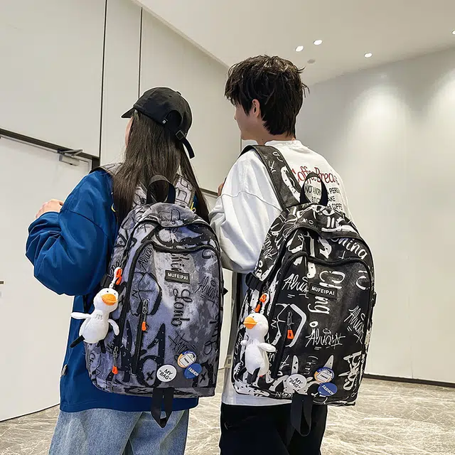 單倉 时尚个性街头涂鸦双肩包初高中学生百搭潮酷大容量旅行 尼龙 书包背包 常规 男女同款情侣款 蓝色/白色/黑色