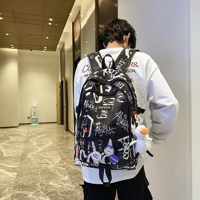 單倉 时尚个性街头涂鸦双肩包初高中学生百搭潮酷大容量旅行 尼龙 书包背包 常规 男女同款情侣款 蓝色/白色/黑色