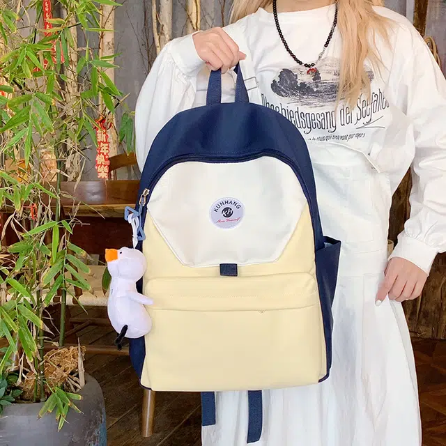 單倉 马卡龙轻便简约撞色日系初高中学生书包小众设计休闲旅行大容量背包 尼龙布 双肩包 男女同款情侣款 粉红色/黄色/蓝色/绿色