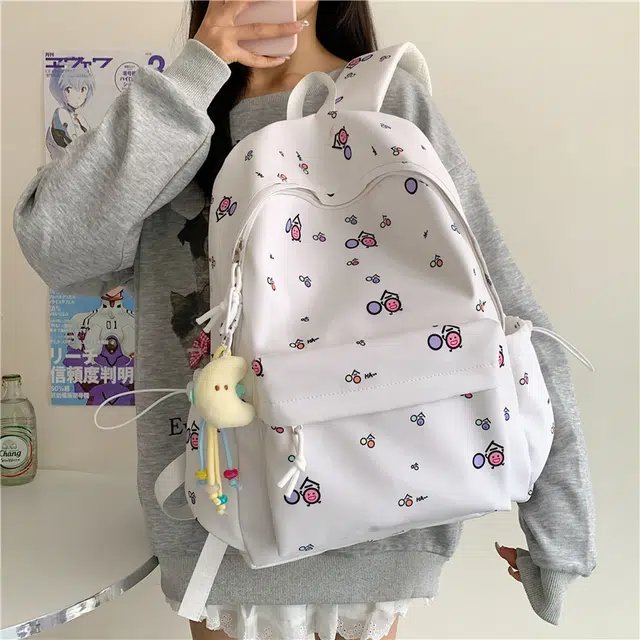 單倉 清新可爱卡通碎花设计感轻便耐磨背包初高中学生大容量通勤百搭书包 牛津布 双肩包 常规 男女同款情侣款 白色/黄色/蓝色/粉色
