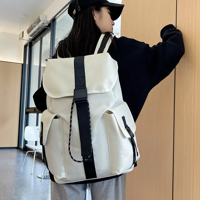 單倉 时尚简约旅游出行通勤百搭学院风设计背包初高中学生大容量轻便耐磨书包 尼龙 双肩包 常规 男女同款情侣款 白色/黑色
