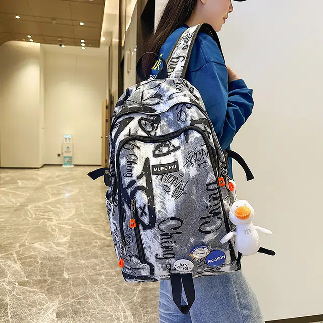 單倉 时尚个性街头涂鸦双肩包初高中学生百搭潮酷大容量旅行 尼龙 书包背包 常规 男女同款情侣款 蓝色/白色/黑色
