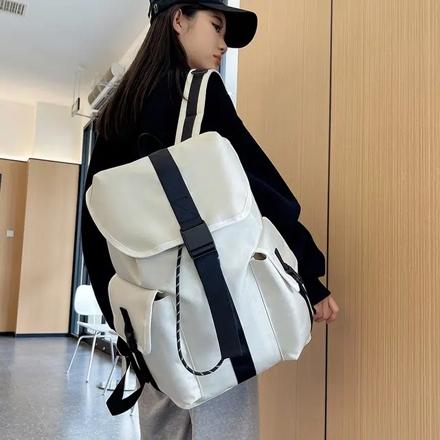 單倉 时尚简约旅游出行通勤百搭学院风设计背包初高中学生大容量轻便耐磨书包 尼龙 双肩包 常规 男女同款情侣款 白色/黑色