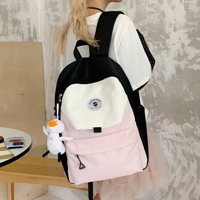 單倉 马卡龙轻便简约撞色日系初高中学生书包小众设计休闲旅行大容量背包 尼龙布 双肩包 男女同款情侣款 粉红色/黄色/蓝色/绿色