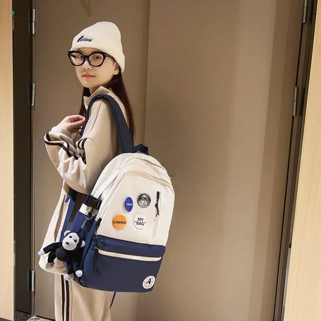 單倉 潮流简约设计大容量初高中学生轻便百搭书包 尼龙 背包双肩包 常规 男女同款情侣款 黑色/黑配白/浅蓝配白/深蓝配白