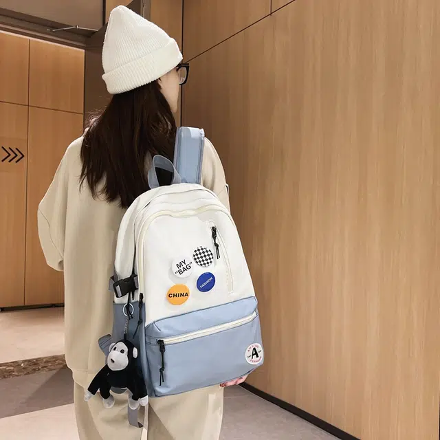 單倉 潮流简约设计大容量初高中学生轻便百搭书包 尼龙 背包双肩包 常规 男女同款情侣款 黑色/黑配白/浅蓝配白/深蓝配白