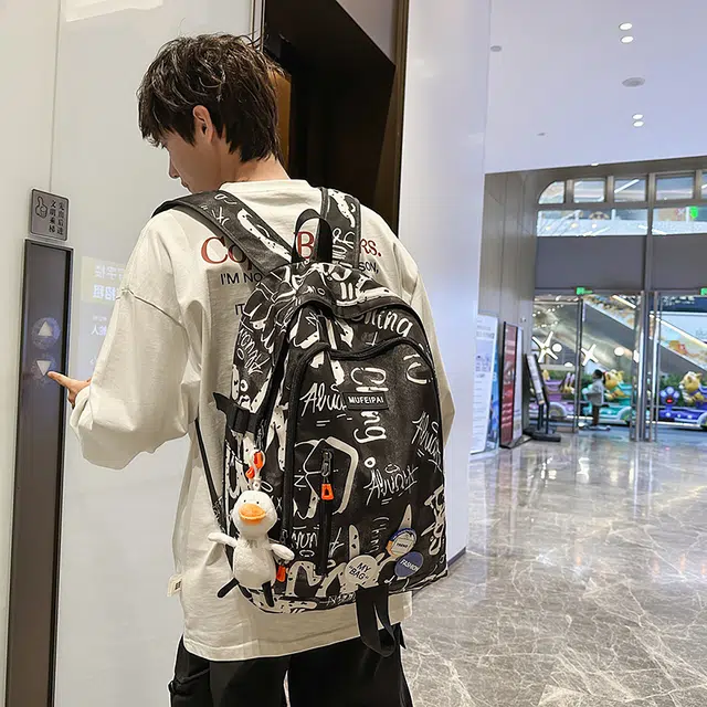 單倉 时尚个性街头涂鸦双肩包初高中学生百搭潮酷大容量旅行 尼龙 书包背包 常规 男女同款情侣款 蓝色/白色/黑色