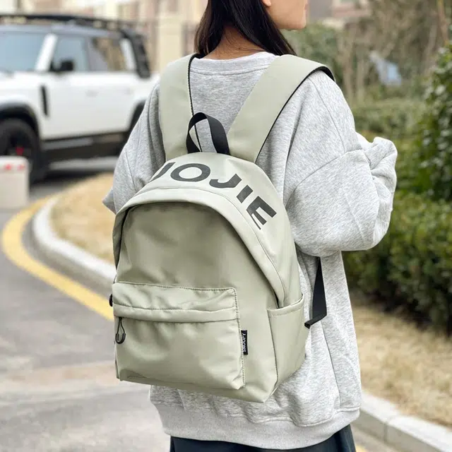 單倉 潮牌小众设计初高中学生大容量轻便减负书包简约学院风通勤百搭旅游背包 尼龙 双肩包 常规 男女同款情侣款 白色/黑色/绿色