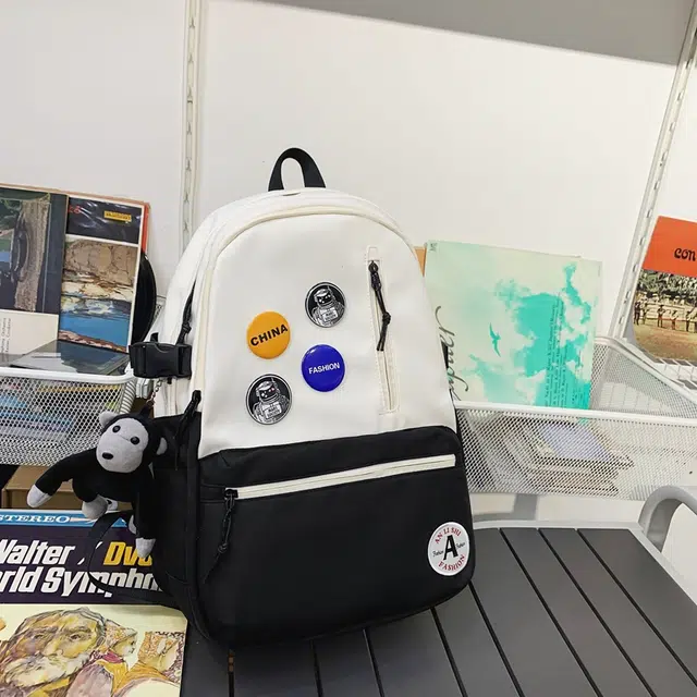 單倉 潮流简约设计大容量初高中学生轻便百搭书包 尼龙 背包双肩包 常规 男女同款情侣款 黑色/黑配白/浅蓝配白/深蓝配白