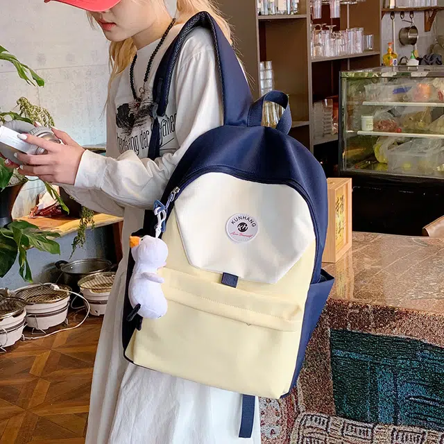 單倉 马卡龙轻便简约撞色日系初高中学生书包小众设计休闲旅行大容量背包 尼龙布 双肩包 男女同款情侣款 粉红色/黄色/蓝色/绿色