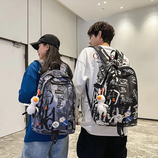 單倉 时尚个性街头涂鸦双肩包初高中学生百搭潮酷大容量旅行 尼龙 书包背包 常规 男女同款情侣款 蓝色/白色/黑色