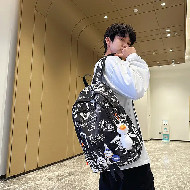 單倉 时尚个性街头涂鸦双肩包初高中学生百搭潮酷大容量旅行 尼龙 书包背包 常规 男女同款情侣款 蓝色/白色/黑色