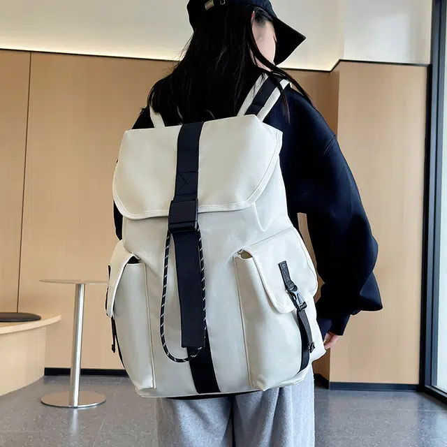 單倉 时尚简约旅游出行通勤百搭学院风设计背包初高中学生大容量轻便耐磨书包 尼龙 双肩包 常规 男女同款情侣款 白色/黑色