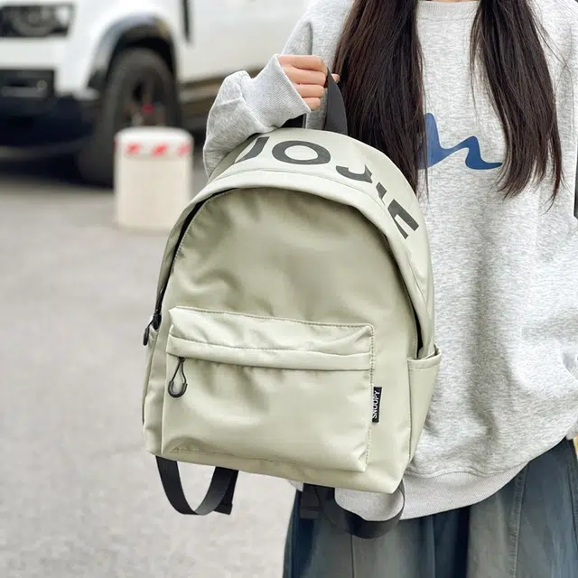 單倉 潮牌小众设计初高中学生大容量轻便减负书包简约学院风通勤百搭旅游背包 尼龙 双肩包 常规 男女同款情侣款 白色/黑色/绿色