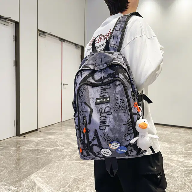 單倉 时尚个性街头涂鸦双肩包初高中学生百搭潮酷大容量旅行 尼龙 书包背包 常规 男女同款情侣款 蓝色/白色/黑色
