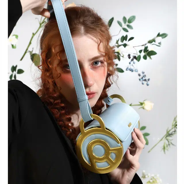 古袋人 独立原创设计小众圆筒包欧美风时尚百搭斜挎包 牛皮 单肩包 女款