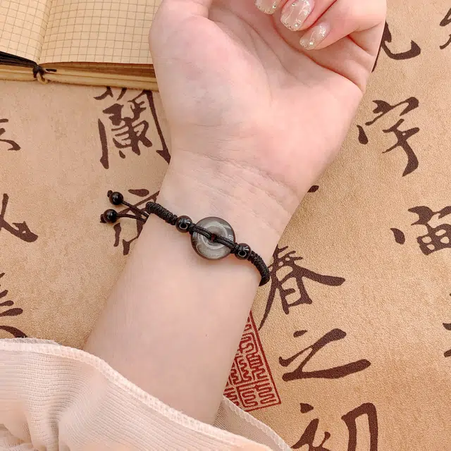 凤祥囍事 老凤祥 国潮招财转运珠高品质 新中式国潮平安扣手工编织简约小众设计冷淡风 好运连连 黑曜石 手绳 男女同款情侣款