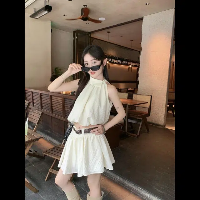 依钗 辣妹时尚无袖露肩花苞挂脖上衣吊带背心短款半身裙两件套【月光沙烁】裙装套装 女款
