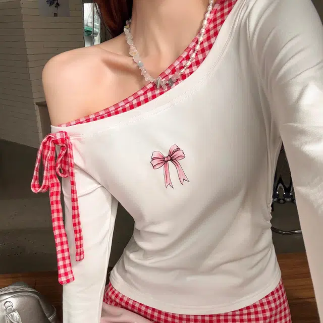 T (