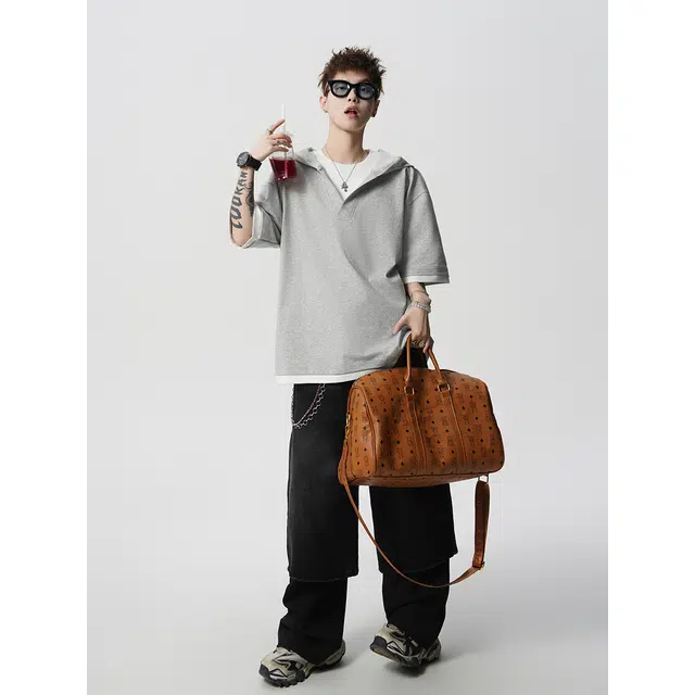 GEOFFREY B. SMALL T