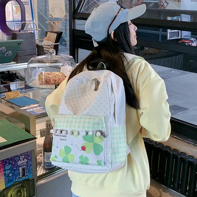 垣途者 日系甜美可爱四叶草波点绒球小清新 复合布面料 双肩包 女款 绿色拼白色