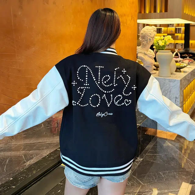 NELY LOGO