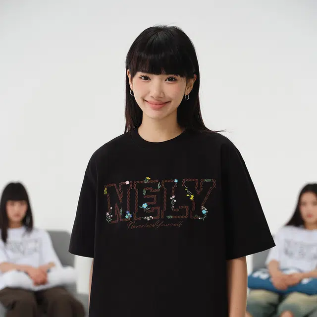 NELY logoT