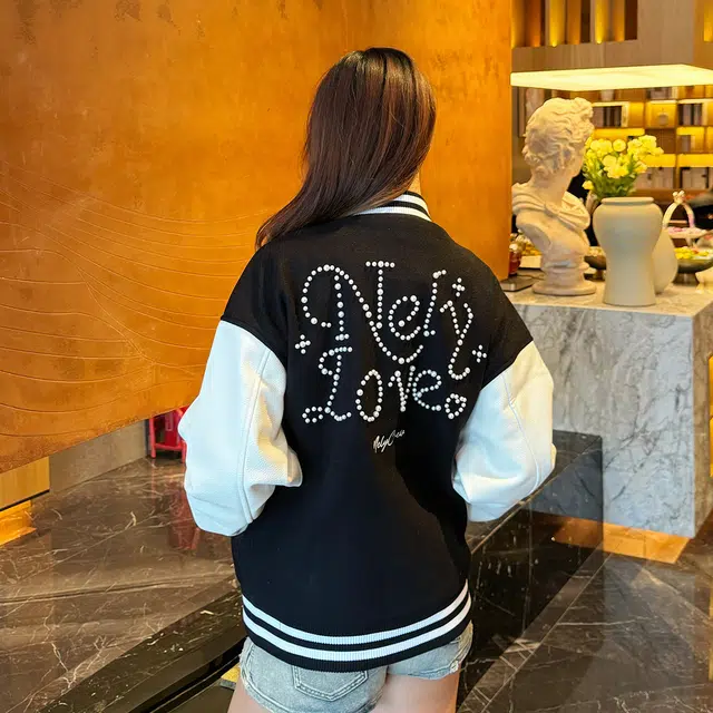 NELY LOGO