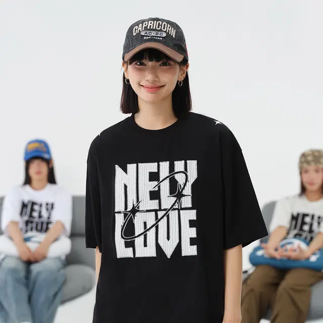 NELY logoT