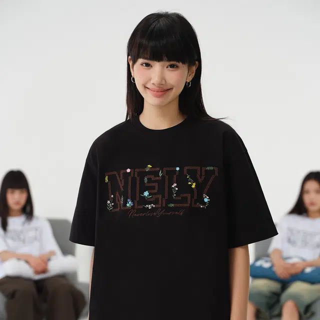 NELY logoT