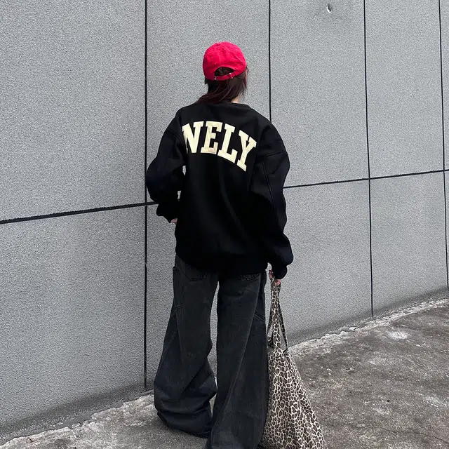 NELY LOGO