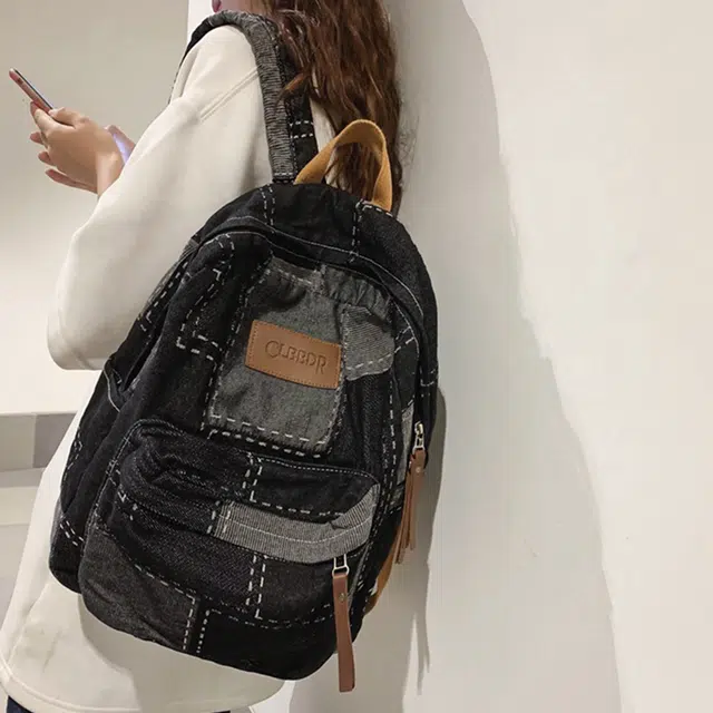 雅鹿 时尚水洗复古拼接出游初高中大学生通勤学院风百搭旅行 牛仔布拼涤纶 双肩包 男女同款情侣款 黑色/蓝色