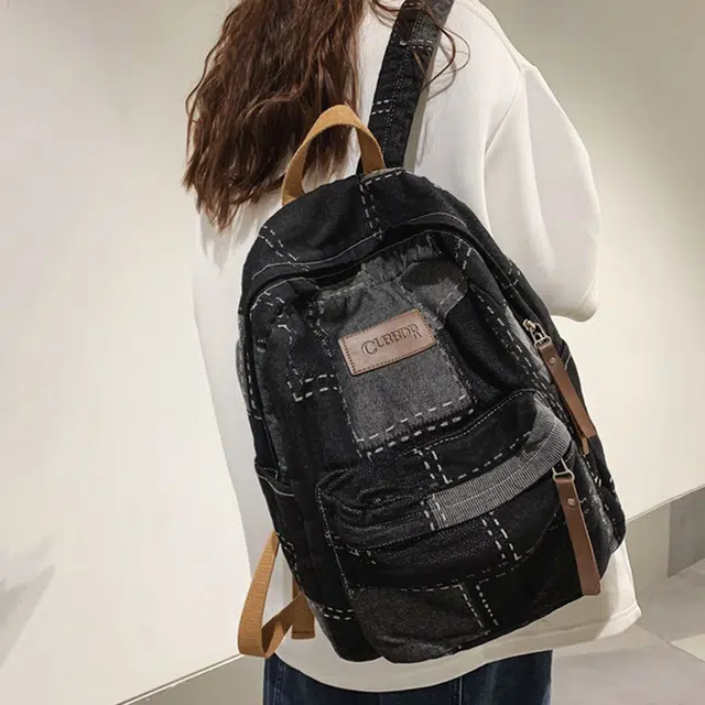 雅鹿 时尚水洗复古拼接出游初高中大学生通勤学院风百搭旅行 牛仔布拼涤纶 双肩包 男女同款情侣款 黑色/蓝色