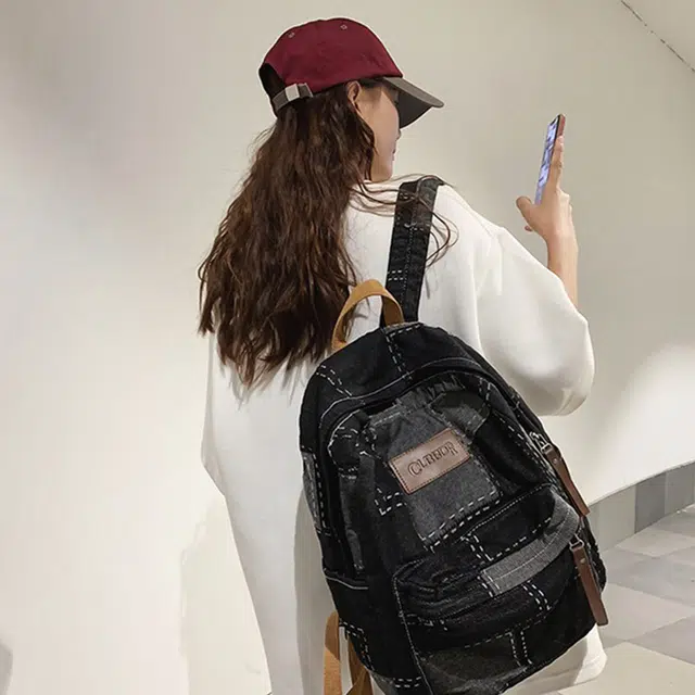 雅鹿 时尚水洗复古拼接出游初高中大学生通勤学院风百搭旅行 牛仔布拼涤纶 双肩包 男女同款情侣款 黑色/蓝色